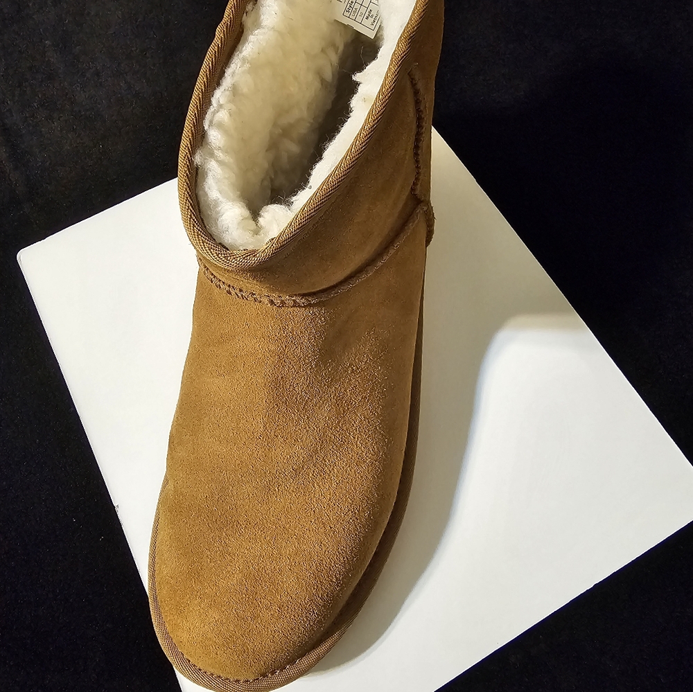 Koolaburra by Ugg.  Tan suede with faux fur lining, size 10 mini boot.